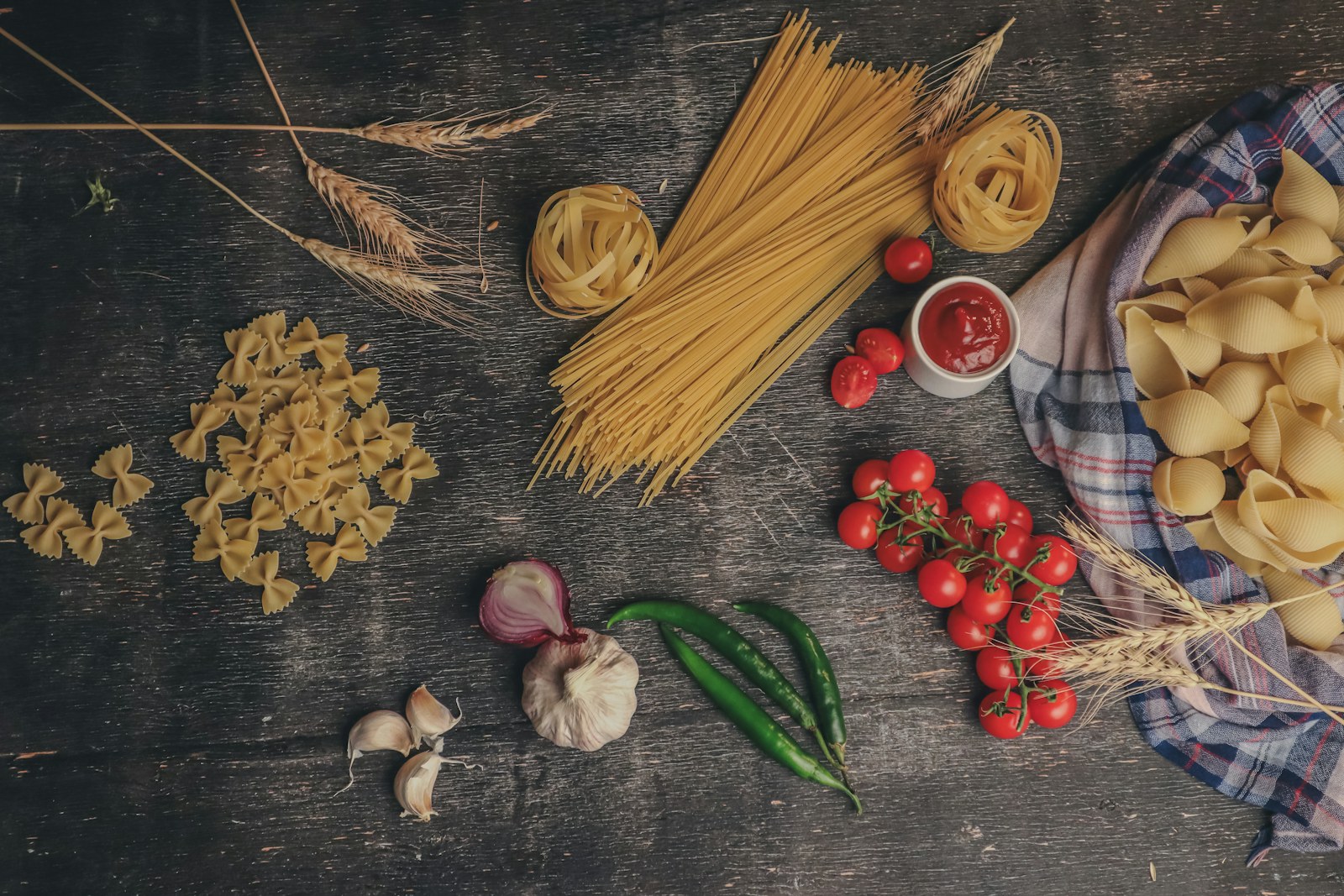 Warm editorial spread of dishes on a dining table